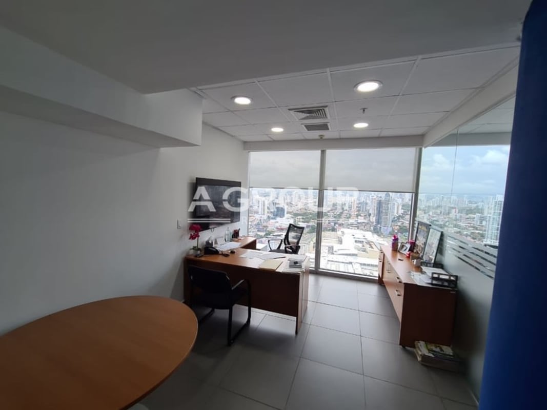 Corporate office interior showing workspace with panoramic city views in Punta Pacifica