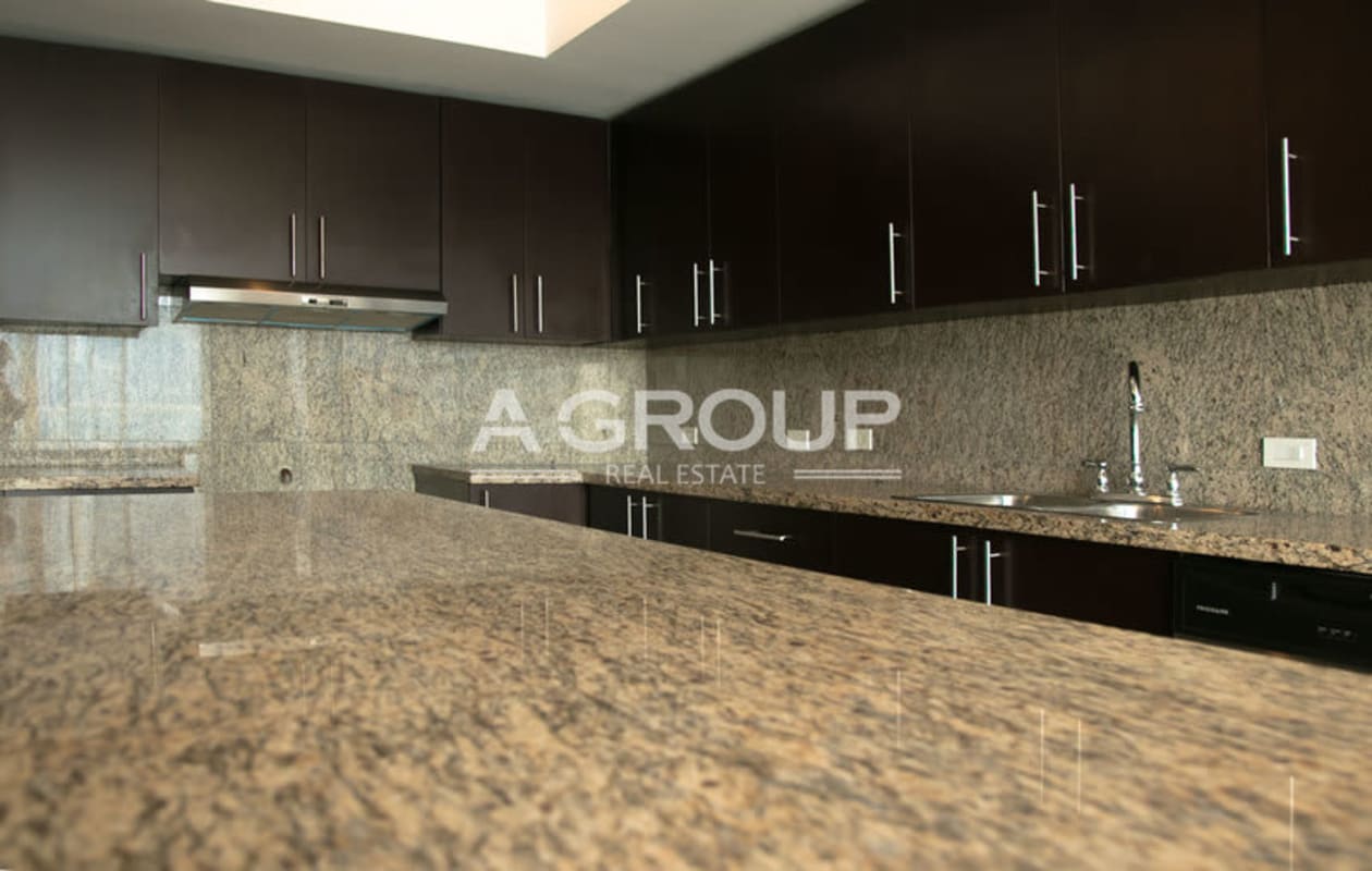 Luxury bathroom with panoramic windows, double vanity, marble finishes The Point Panama