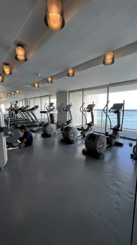 Modern gym and fitness center overlooking the ocean in PH Yoo Panama