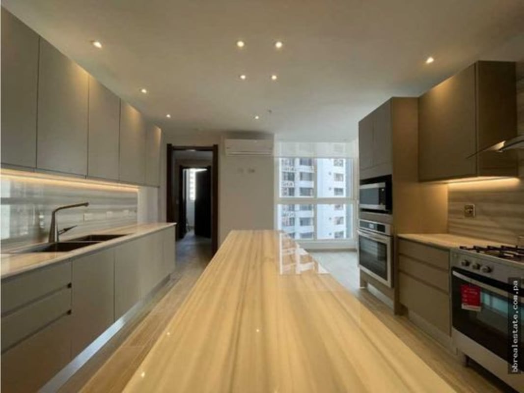 Spacious master bedroom featuring ocean views, large windows and luxury finishes PH The Towers Panama