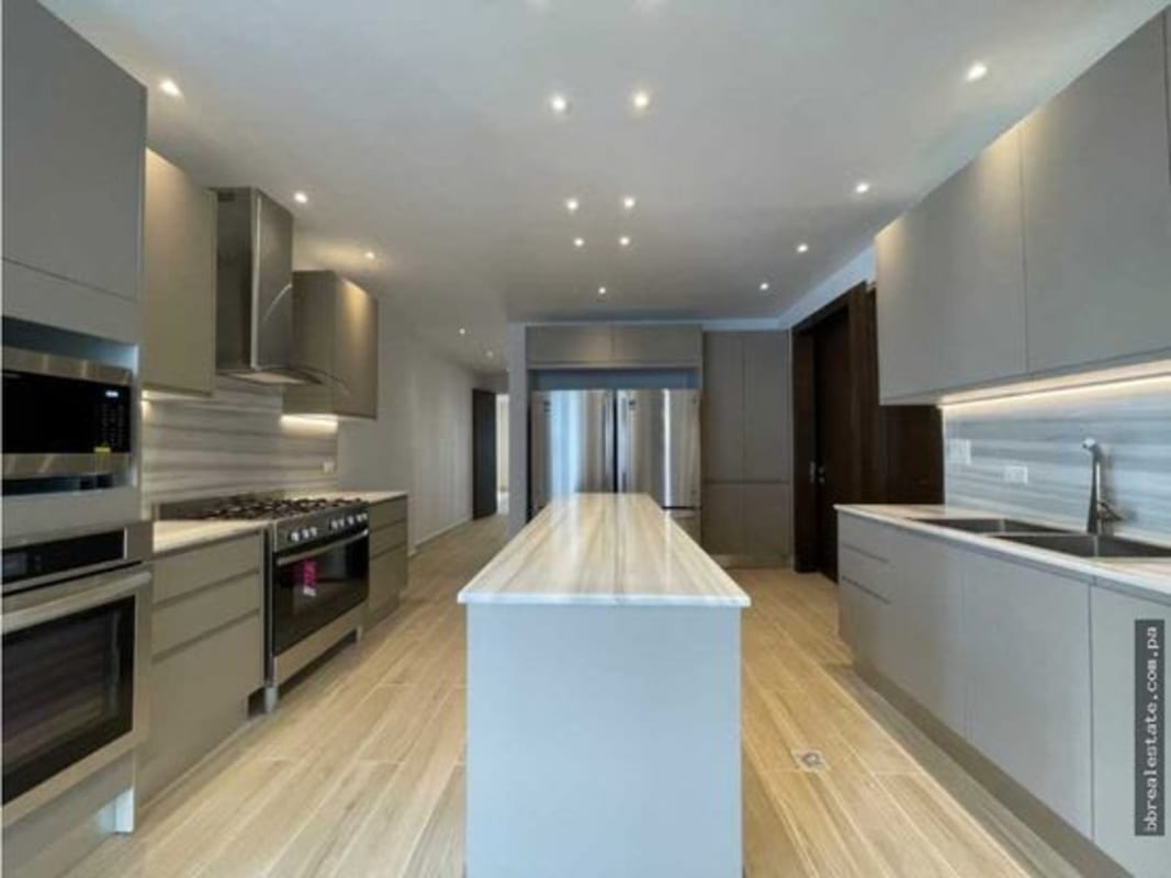 Fully equipped luxury kitchen with marble countertops, stainless appliances in PH The Towers Panama City