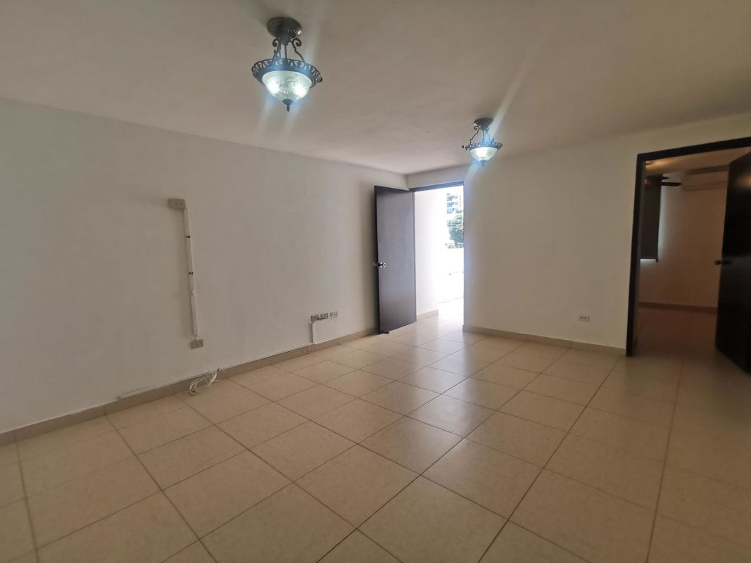 Open concept living dining room with natural light and balcony in HIP Tower Panama City