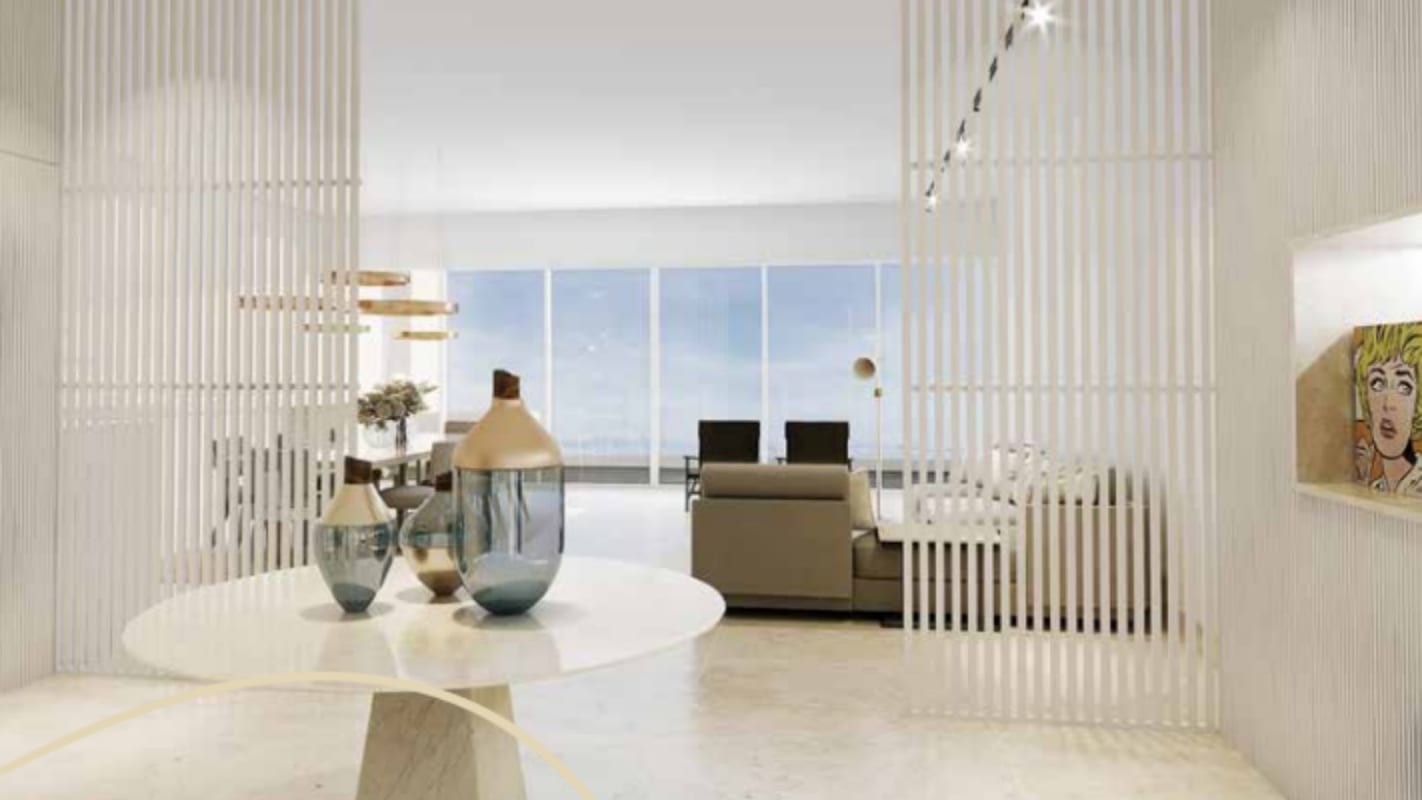 Spacious living dining room with panoramic city and ocean views in PH Ocean Pearl Ocean Reef