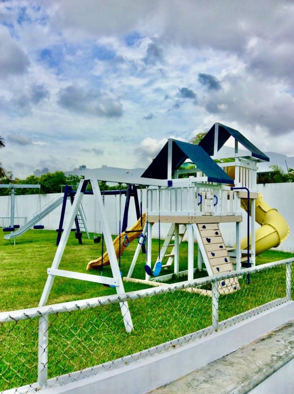 Private community playground and lawn adjacent to seafront land Costa del Este