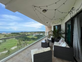 Bright spacious living room with panoramic ocean view balcony at PH Las Olas II, Vistamar, San Carlos Panama