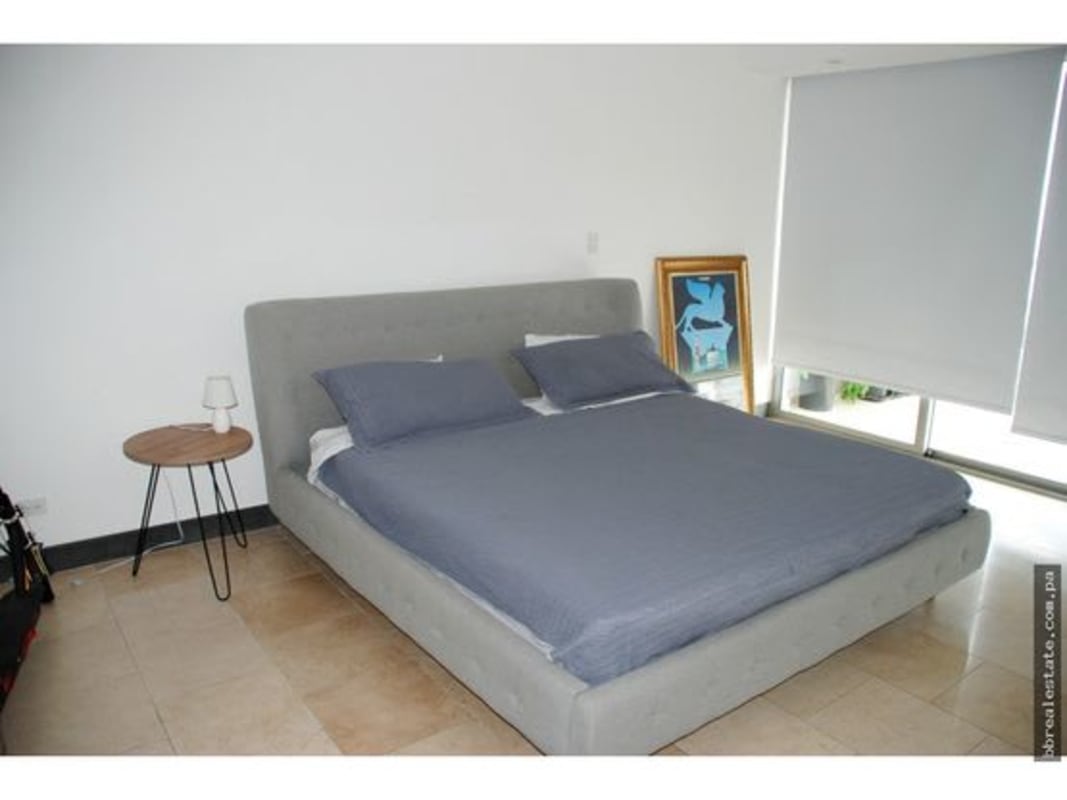 Elegant lobby area with seating, marble floors PH TOC Punta Pacifica luxury condominium