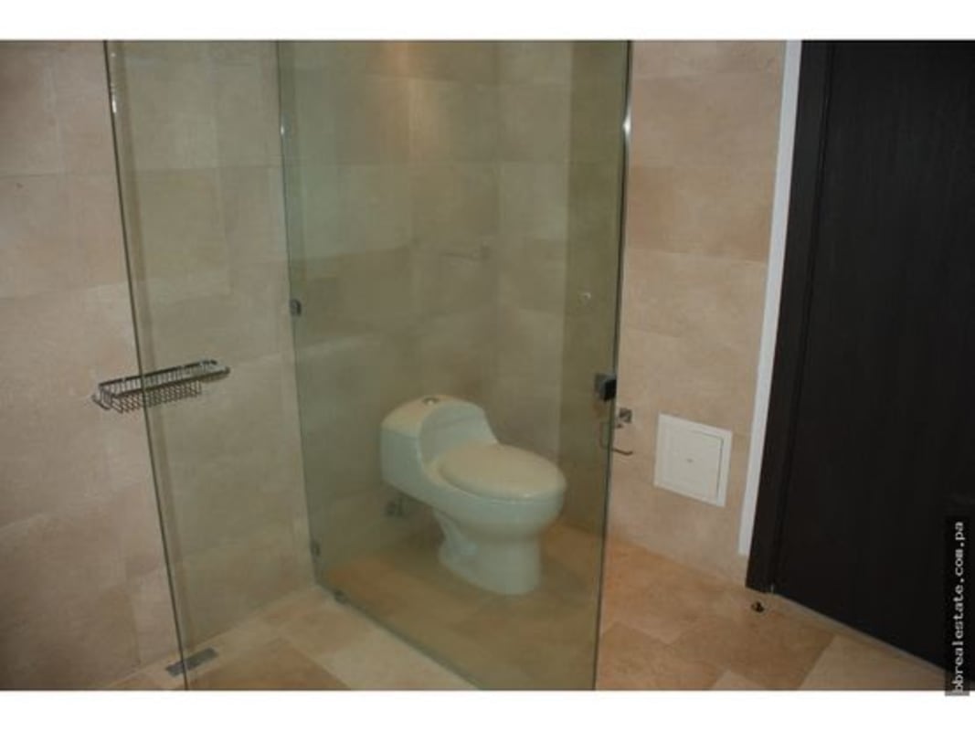 Master bedroom with ocean view windows, ensuite marble bathroom in PH TOC Punta Pacífica