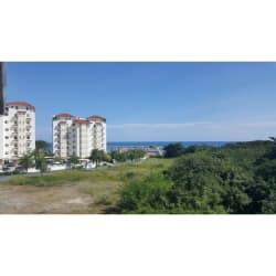 Spacious living area with ocean views double-height ceiling in PH Roca Marina Vista Mar Resort Panama