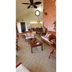 Contemporary kitchen with granite counters and cabinetry in Vista Mar Resort penthouse Panama