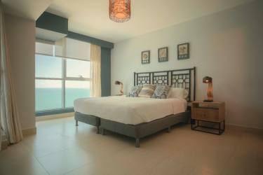 Bedroom with panoramic ocean views large windows modern design Playa Blanca