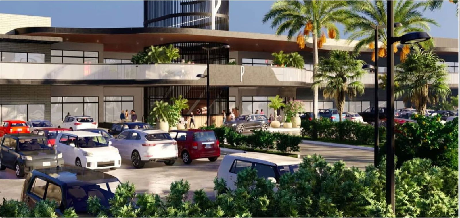 Day exterior of Plaza Paseo Drive with parking and palm landscaping in Brisas del Golf
