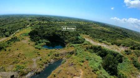 Large green land with natural water features for development San Carlos Panama