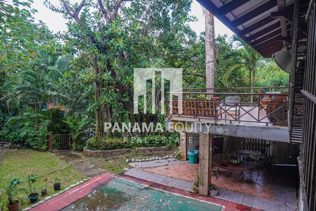 Lobby area with wooden floors and colonial features Ancon Panama duplex for sale