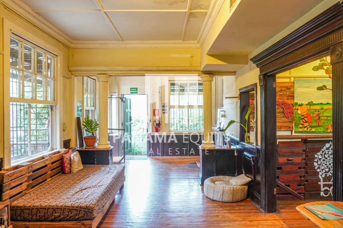 Rustic blue-green bedroom with AC and wooden panels historic Ancon Panama