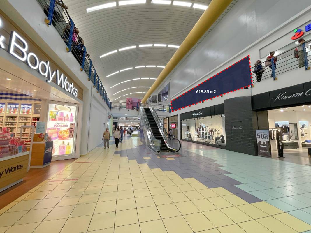 Second floor commercial unit with escalator access, vibrant signage and customer flow at Albrook Mall Panama