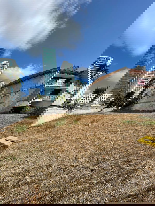 990m2 urban lot cleared for sale in Punta Paitilla with skyline in background Panama City