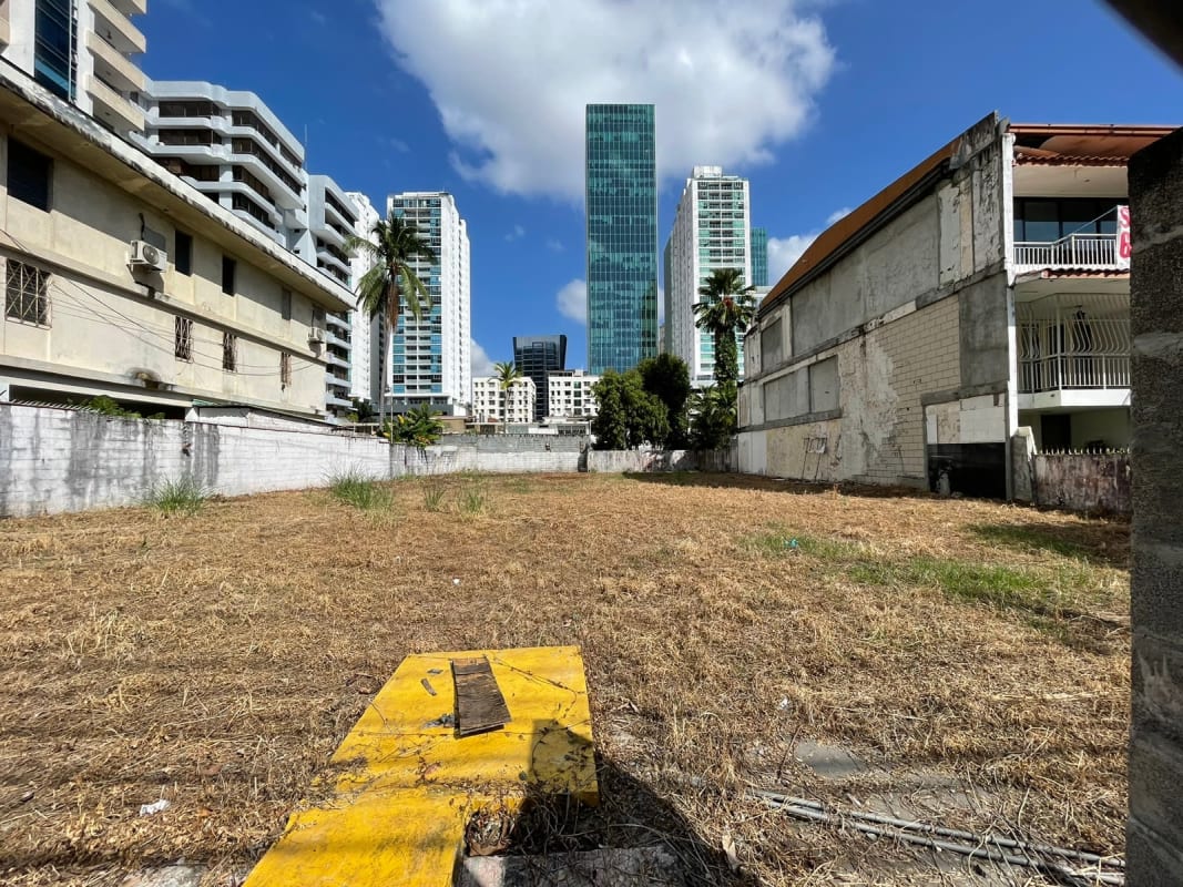 Empty parcel near luxury towers with ocean skyline view in Panama City
