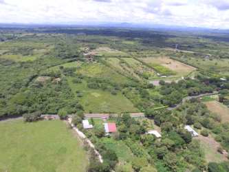 Aerial of 72-hectare Panama property with countryside, lagoon, river