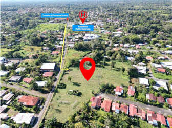 Marked aerial map of large lot and surrounding schools, health center, and roads, La Concepción Bugaba