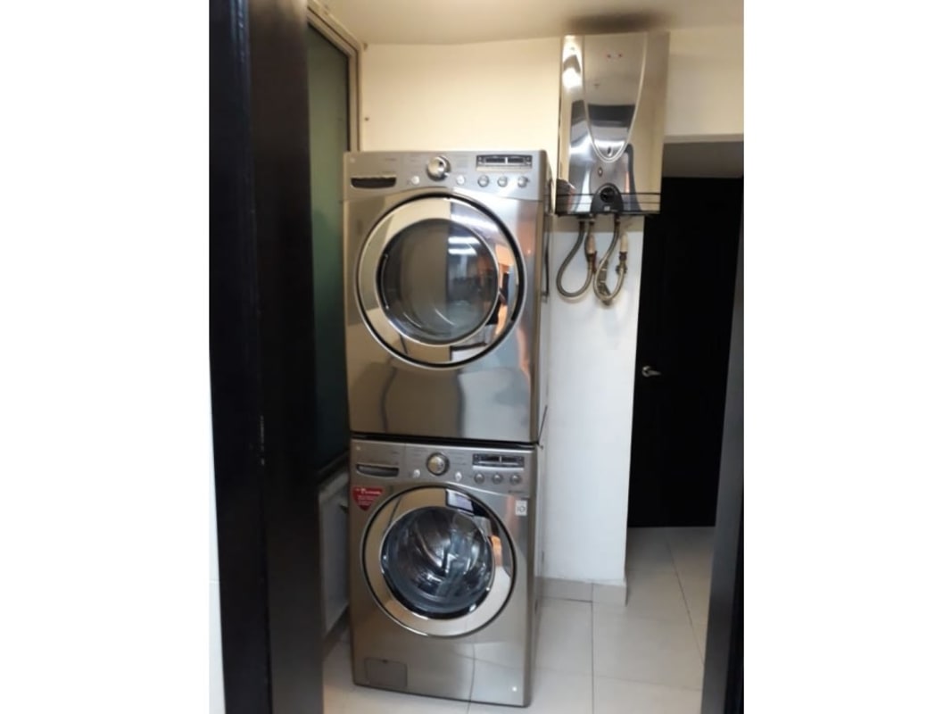 Modern laundry room with washer dryer and water heater San Francisco Panama rental apartment