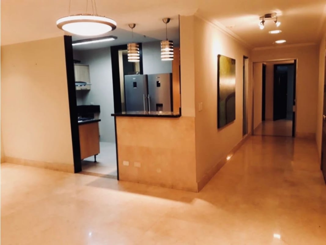 Modern kitchen with breakfast bar and appliances marble floors San Francisco Panama apartment