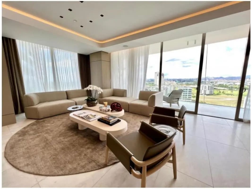 Modern living room with large windows, luxury finishes, golf course views in Santa Maria La Maison by Fendi