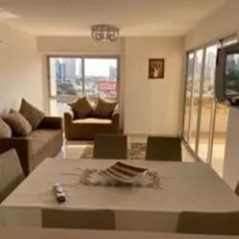 Spacious living dining room with large windows city view PH Vicky Village Bella Vista Panama