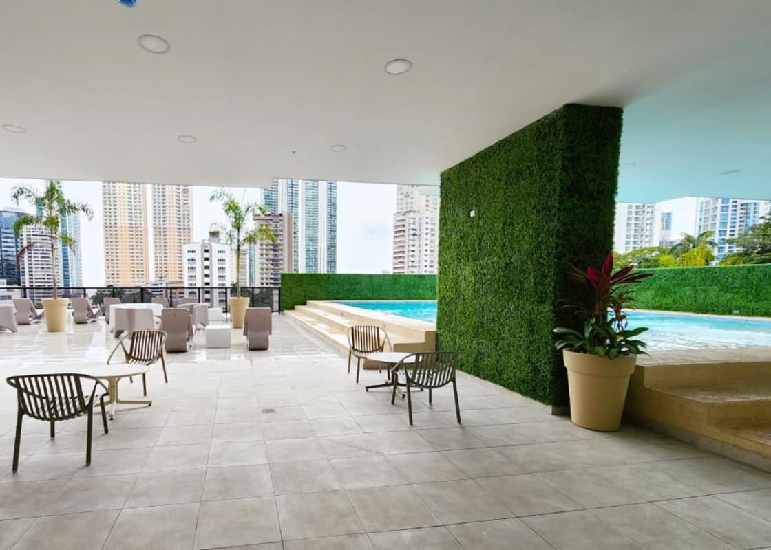 Infinity swimming pool rooftop with skyline view in The Gray Panama City