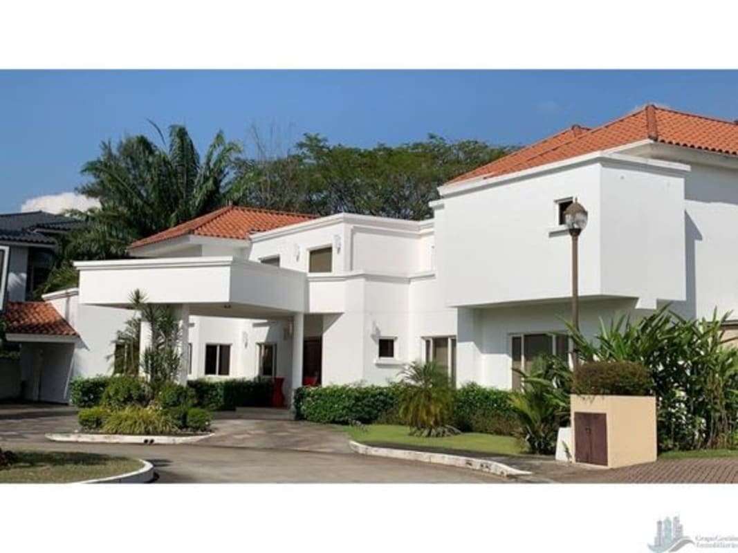 Grand marble entrance foyer with spiral staircase and chandelier, Costa del Este Panama