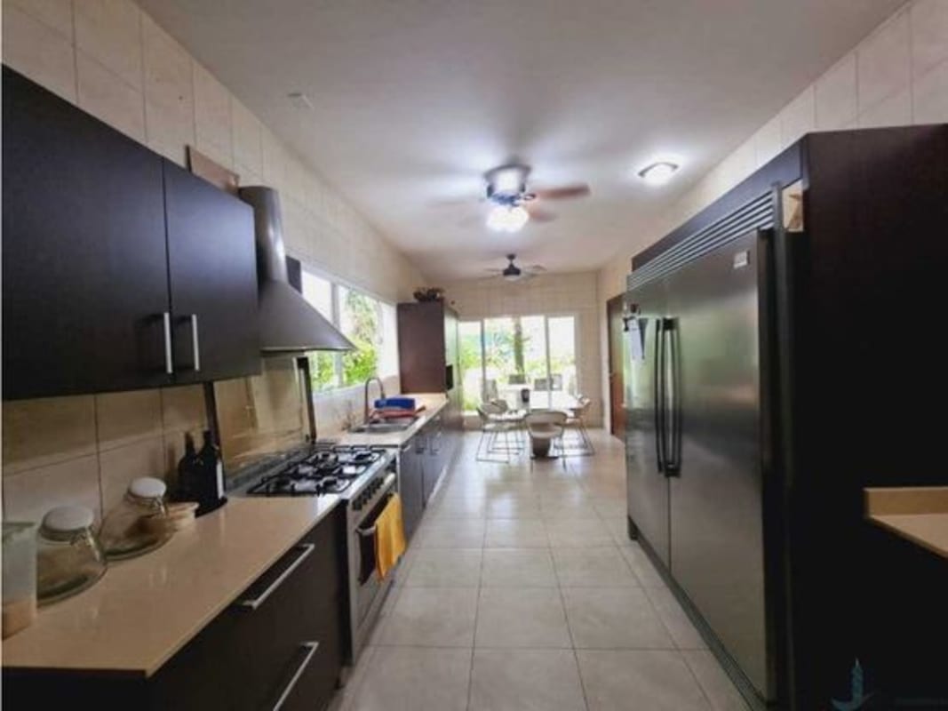 Private rectangular swimming pool and tropical garden luxury house Panama