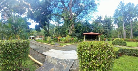 Bathroom with wall-mounted sink wall mirror minimalist decor at Villa Laurel Creek Altos del Maria Panama