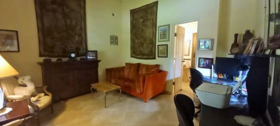 Living room with office area fireplace artwork mountain villa Altos del Maria Panama