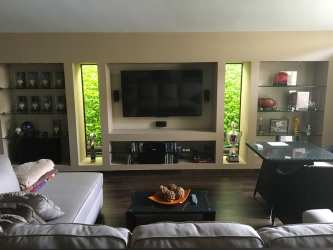 Modern clubhouse and tropical resort pool at River Valley Panama Pacifico