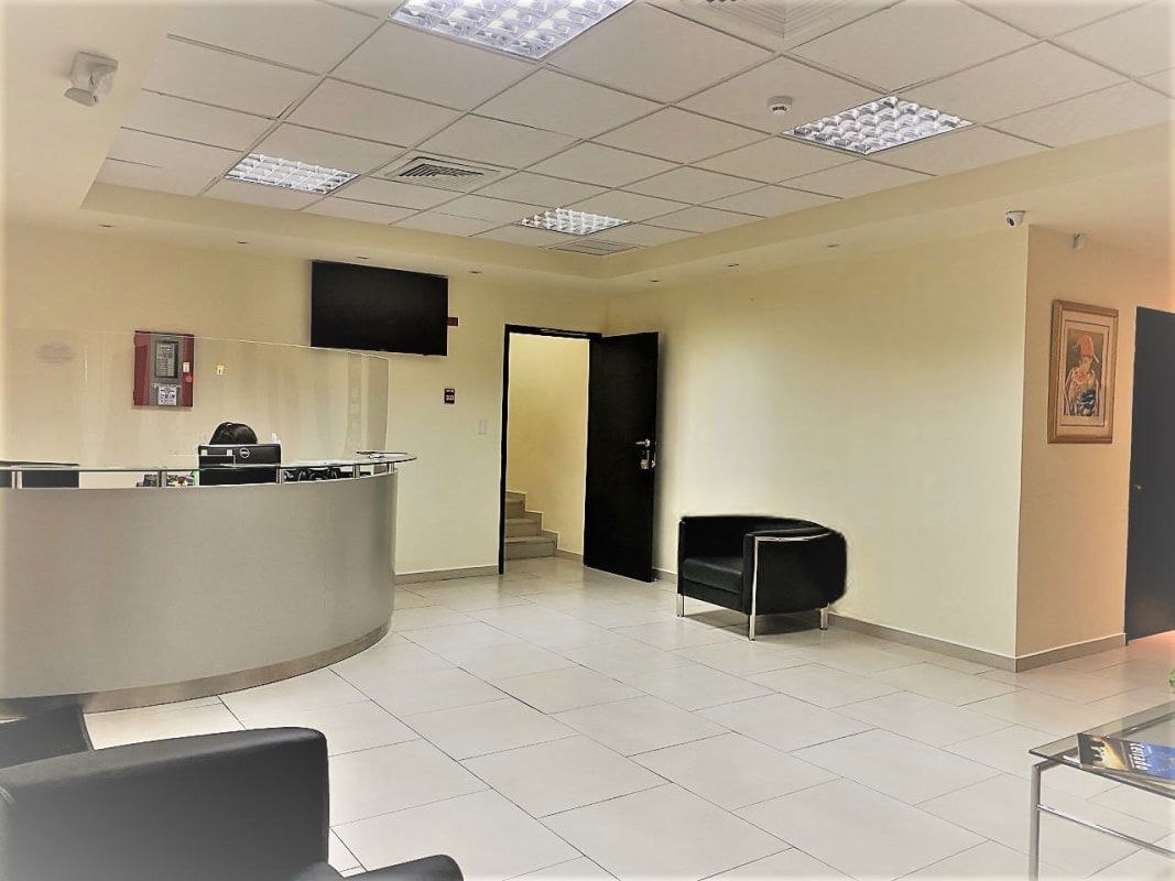 Glass wall interior office with tiled floor on Via Porras Panama City