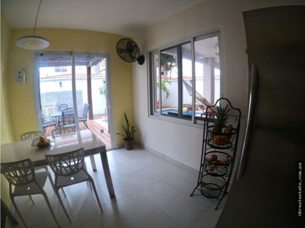 Dining area with sliding doors to garden patio in Quintas de Versalles Panama City