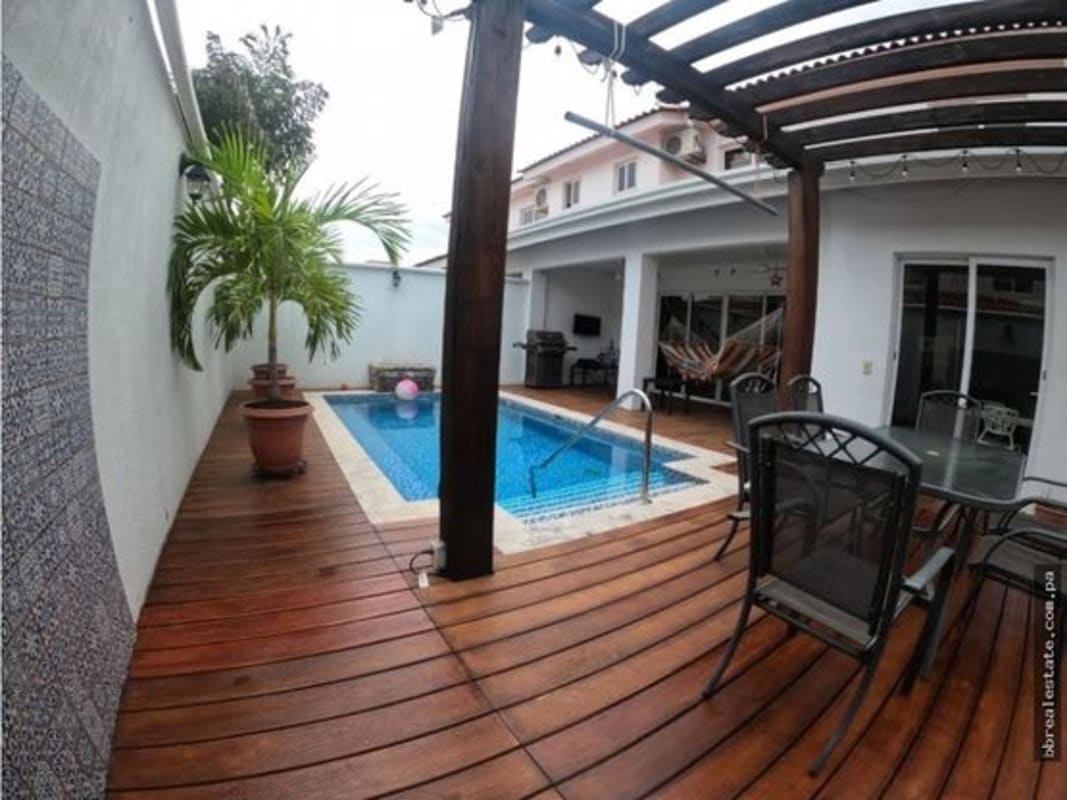 Backyard with private pool, wooden deck, pergola in PH Quintas de Versalles Panama City