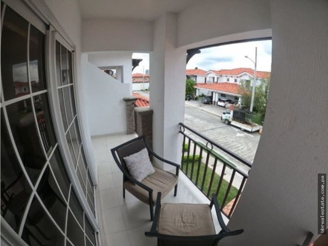 Private balcony overlooking neighborhood street in Quintas de Versalles Panama