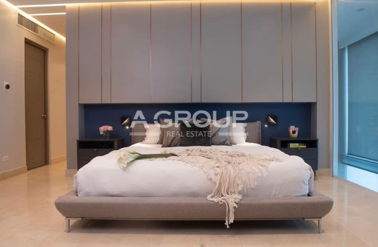 Modern bedroom loft double height floor to ceiling windows ocean view PH Pacific Village Panama