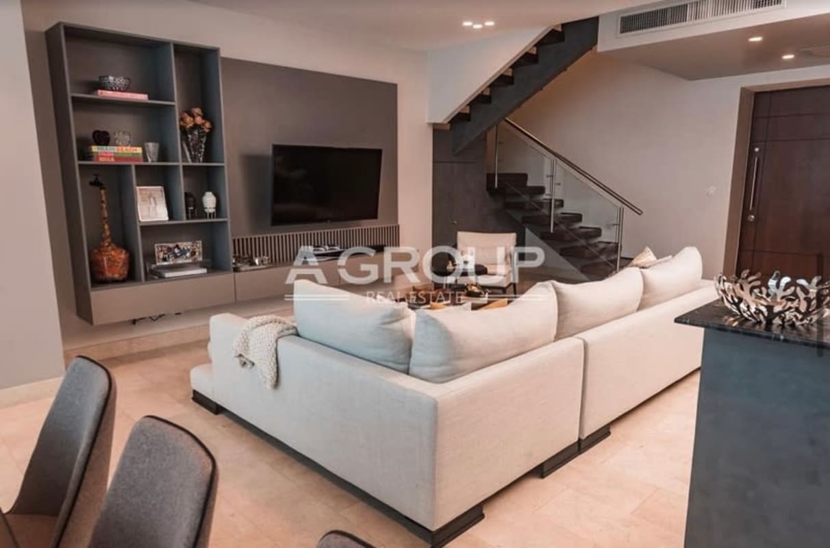 Spacious living loft space balcony double-height ceilings PH Pacific Village Punta Pacifica Panama