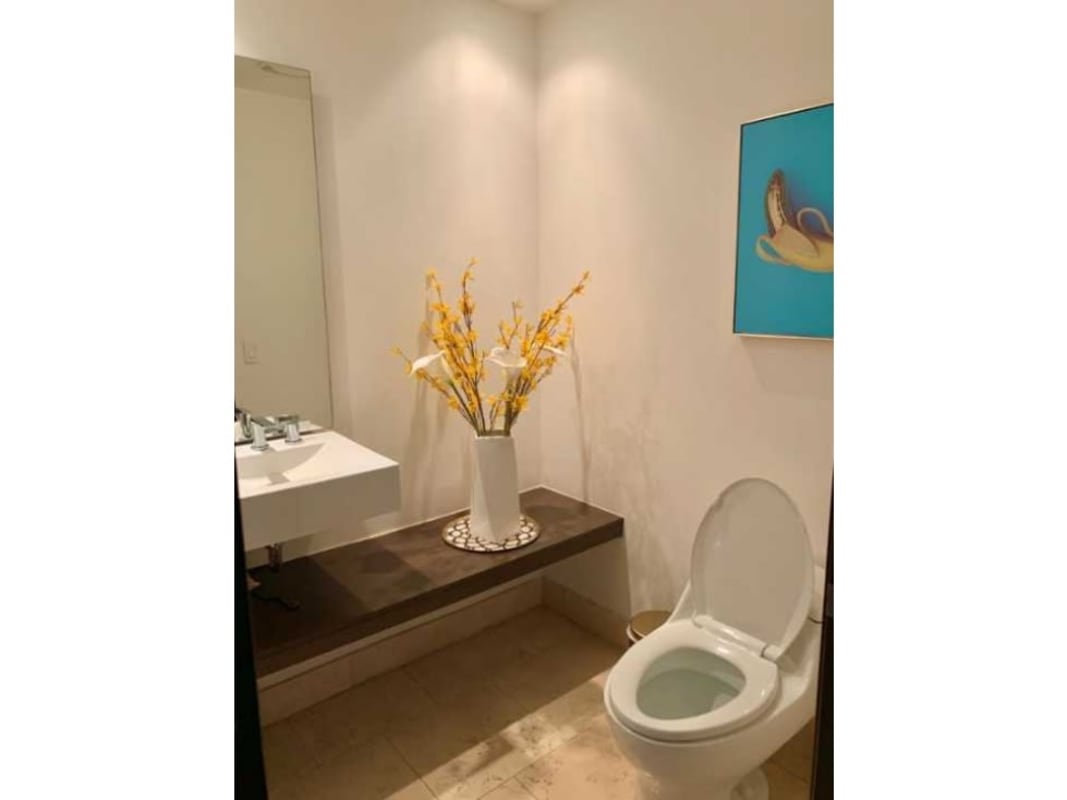 Contemporary bathroom with floating vanity and mirror at The Ocean Club JW Marriott Panama