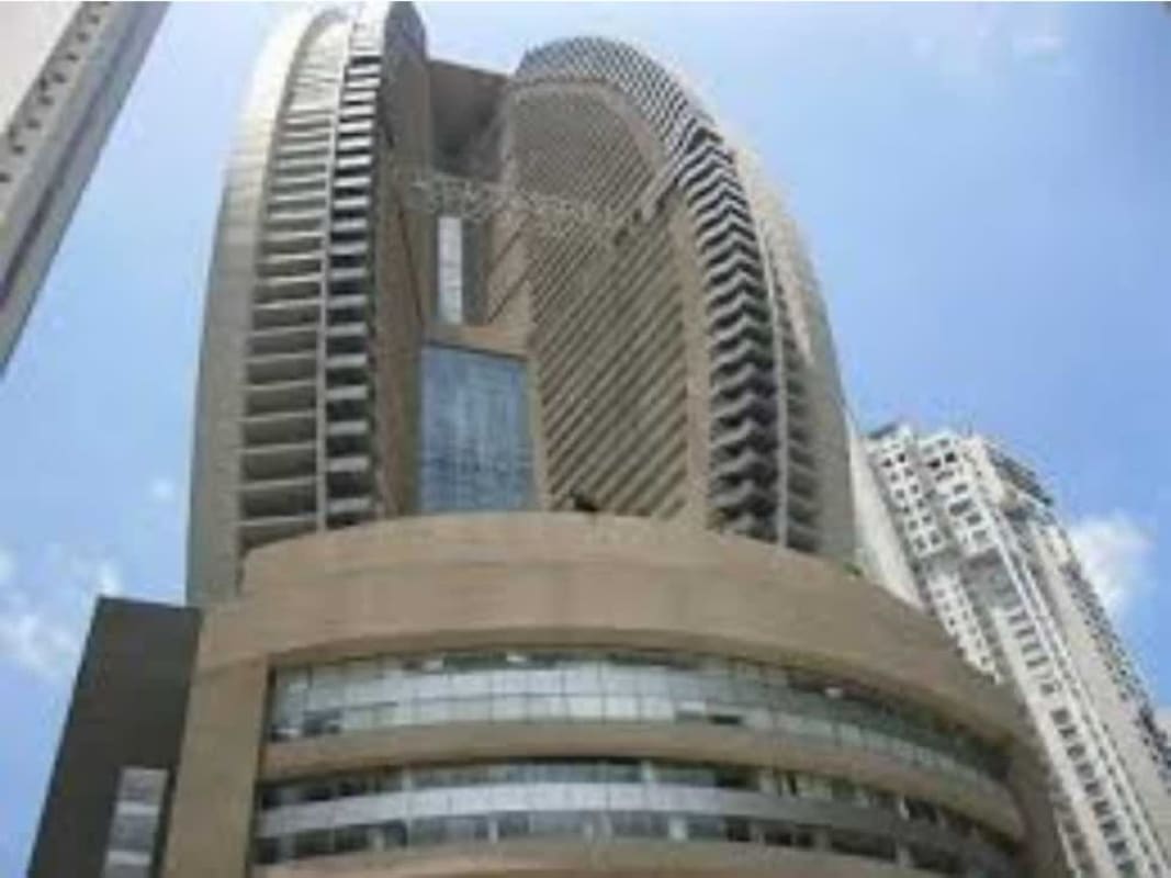 Poolside cabanas and lounge chairs with ocean view at The Ocean Club JW Marriott Panama City