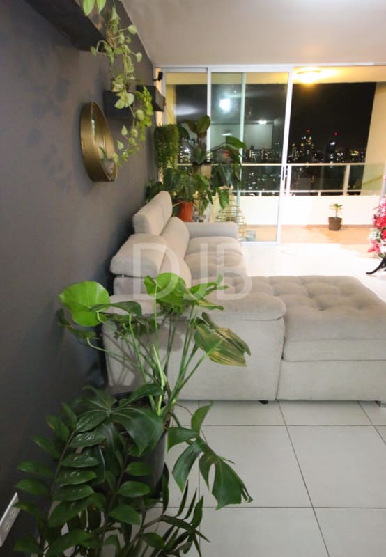 Bright living room with access to balcony in PH Park View San Francisco Panama apartment for sale