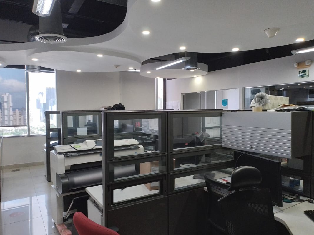 Glass cubicles with skyline views modern open office in Pacific Point Punta Pacifica Panama