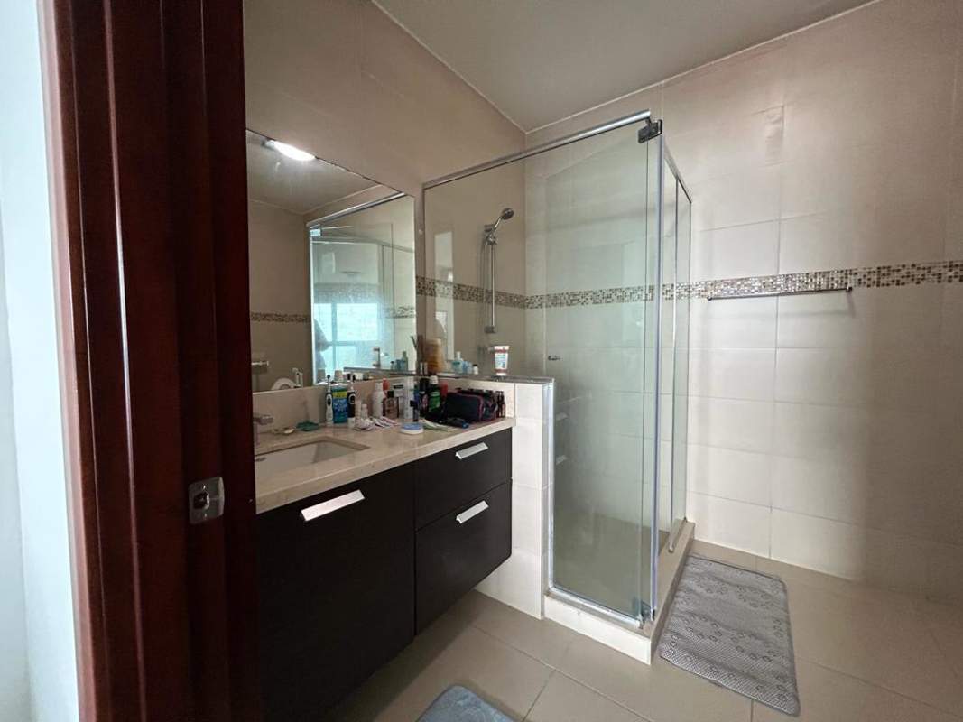 Modern bathroom with double sink granite countertop glass shower PH Oceanaire Panama