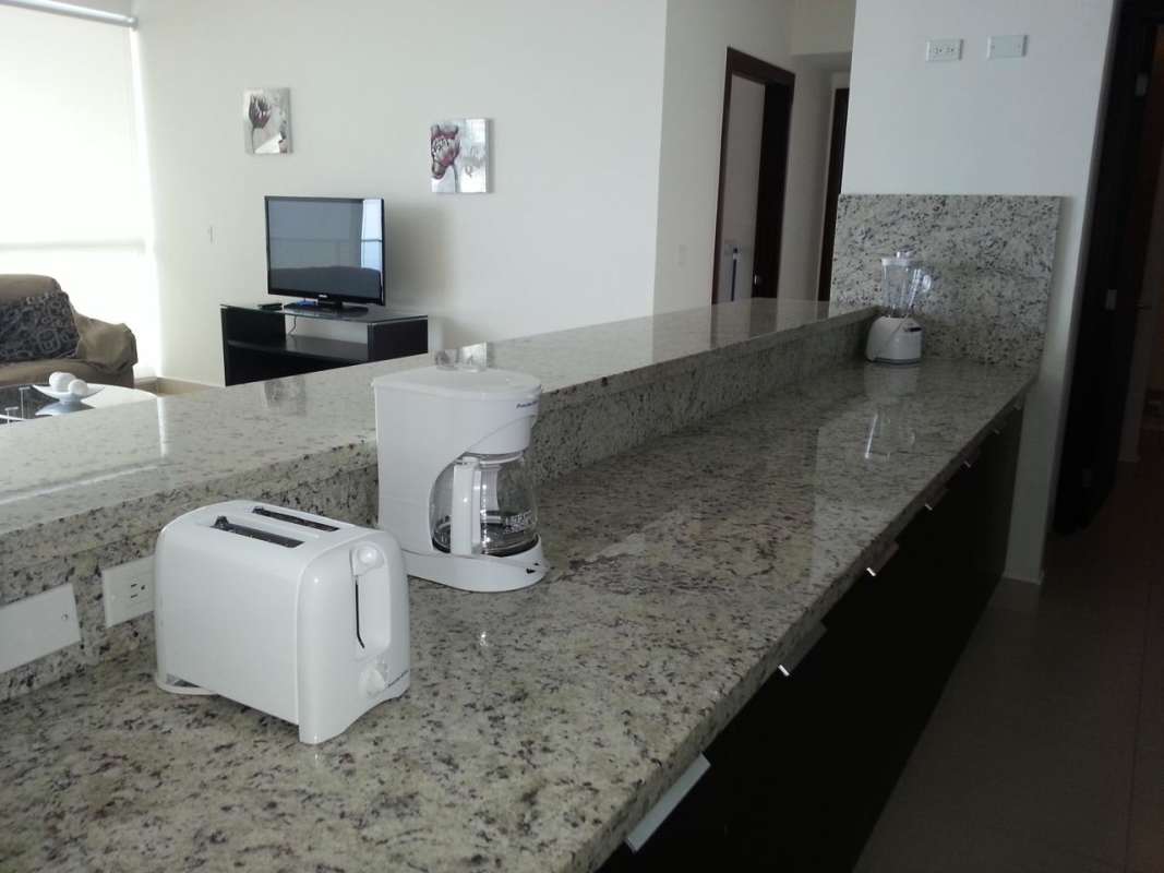 Modern kitchen with granite counters stainless steel appliances PH Oceanaire Panama