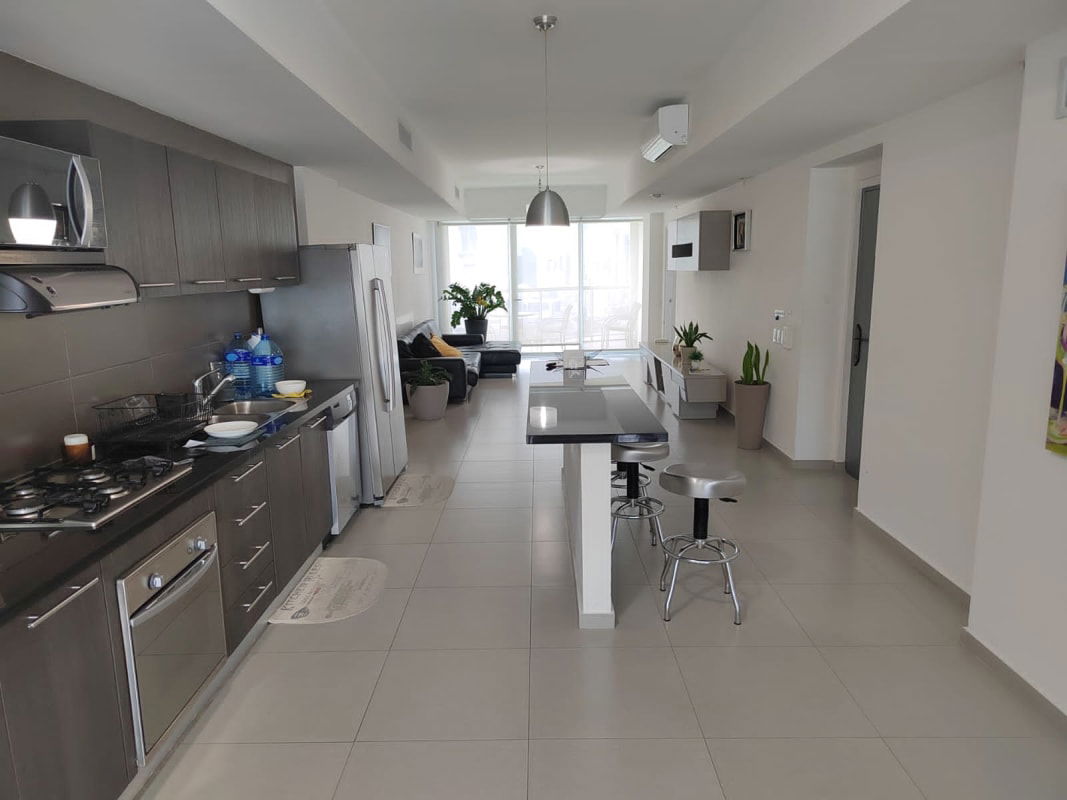 Expansive balcony with views of ocean and skyline at Yacht Club Tower Panama