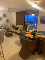 Open living and dining room with balcony access PH Villa Azul Playa Blanca Panama