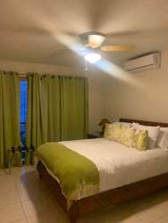 Second bedroom with closet and window Playa Blanca Villa Azul Panama