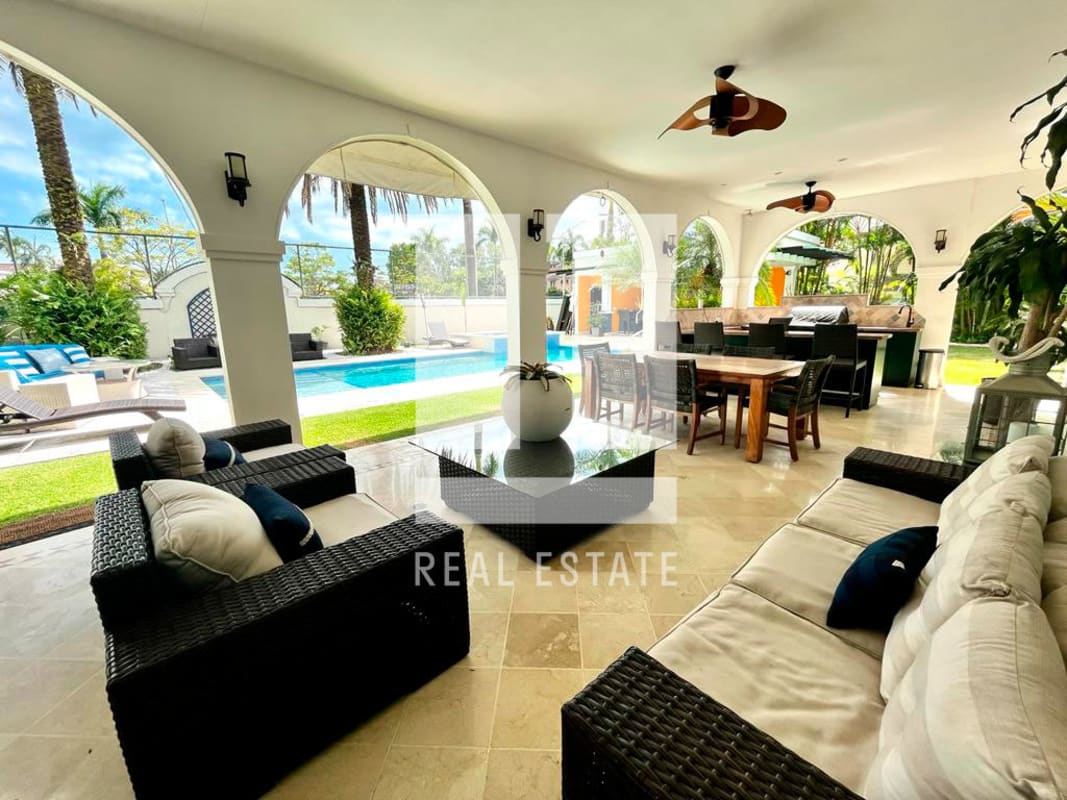 Luxury kitchen with granite island, stainless appliances, marble floors in Costa del Este Royal Pacific Panama