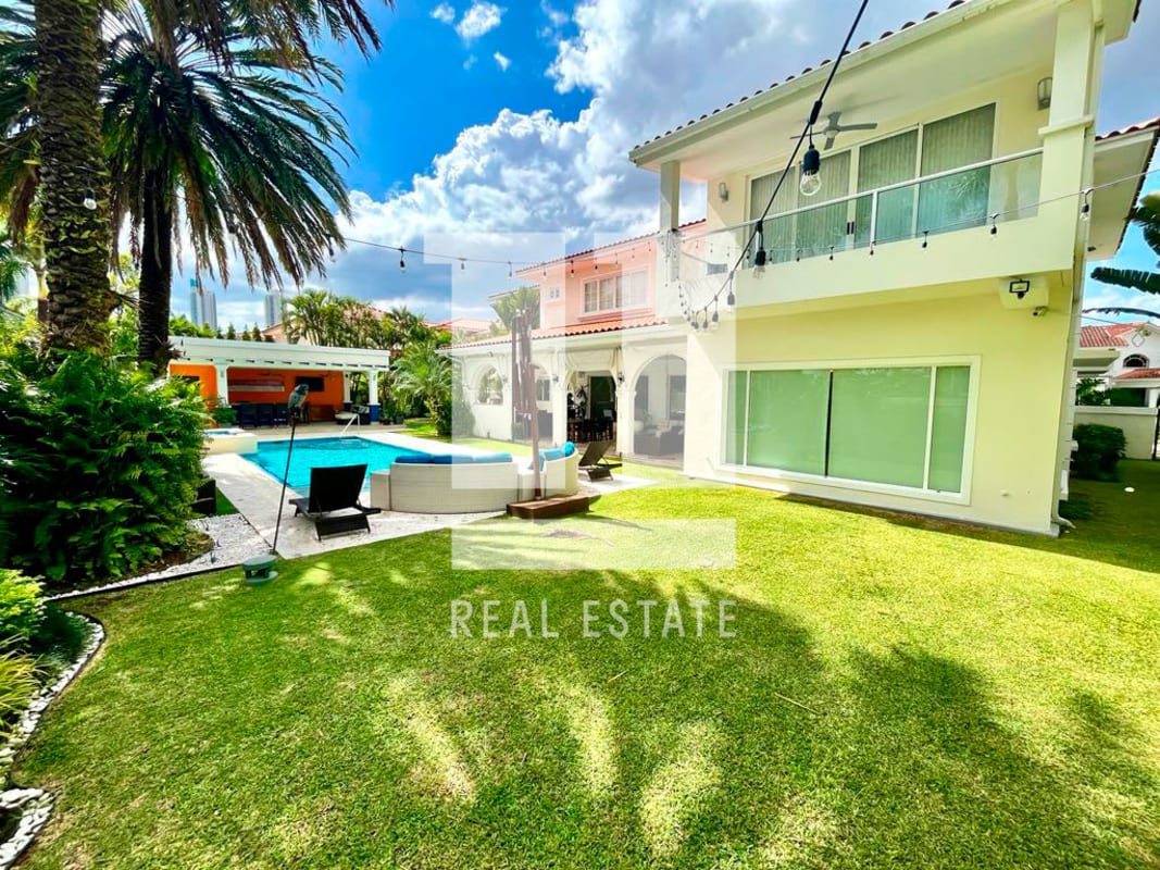 Elegant foyer with marble staircase, chandelier, open mezzanine Royal Pacific Costa del Este Panama
